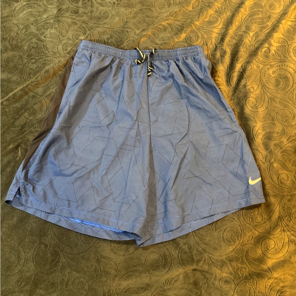 Blue Athletic Nike Running Shorts for Men.